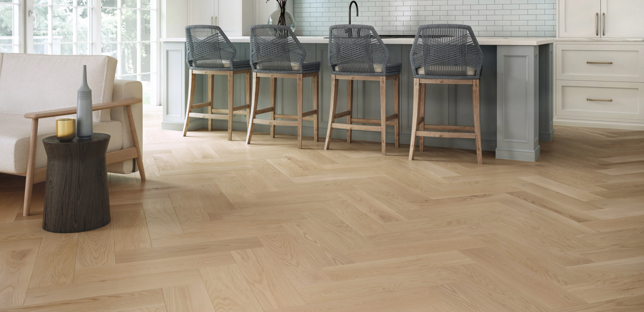 Hardwood flooring installed in a bright kitchen and living space