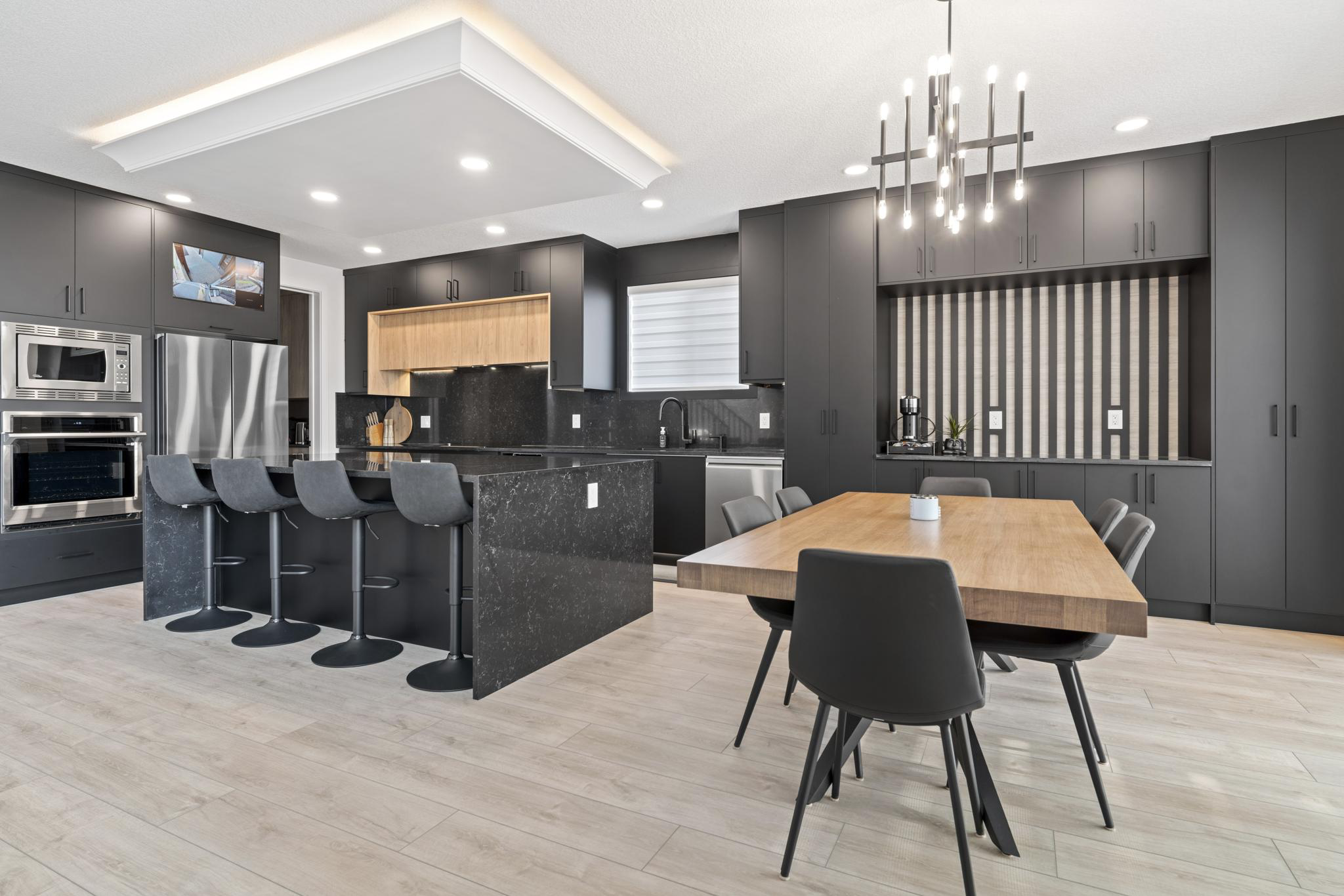 Vinyl flooring installed in a modern kitchen and dining area